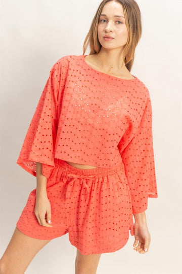 Eyelet long sleeve top and shorts.
