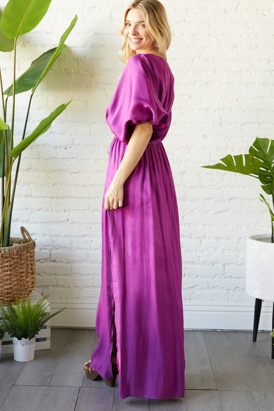 Loose dress with fitted waist.