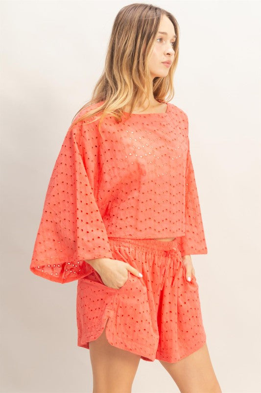 Eyelet long sleeve top and shorts.