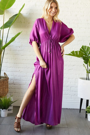 Loose dress with fitted waist.